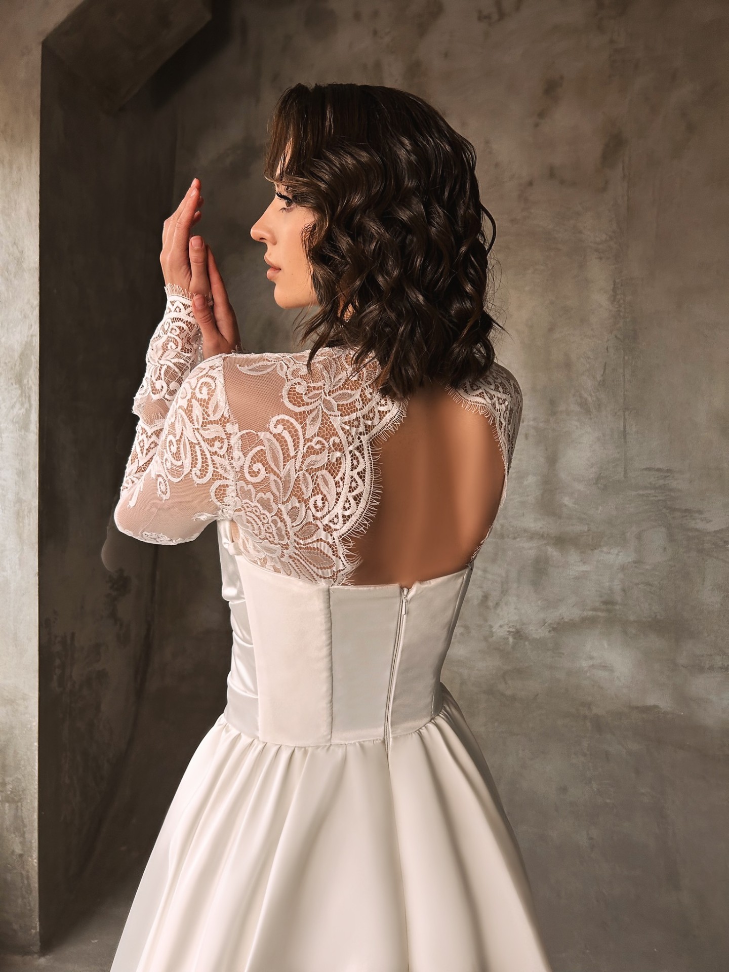 Roberta — back detail of the sheer floral lace yoke with open keyhole and flared lace cuff