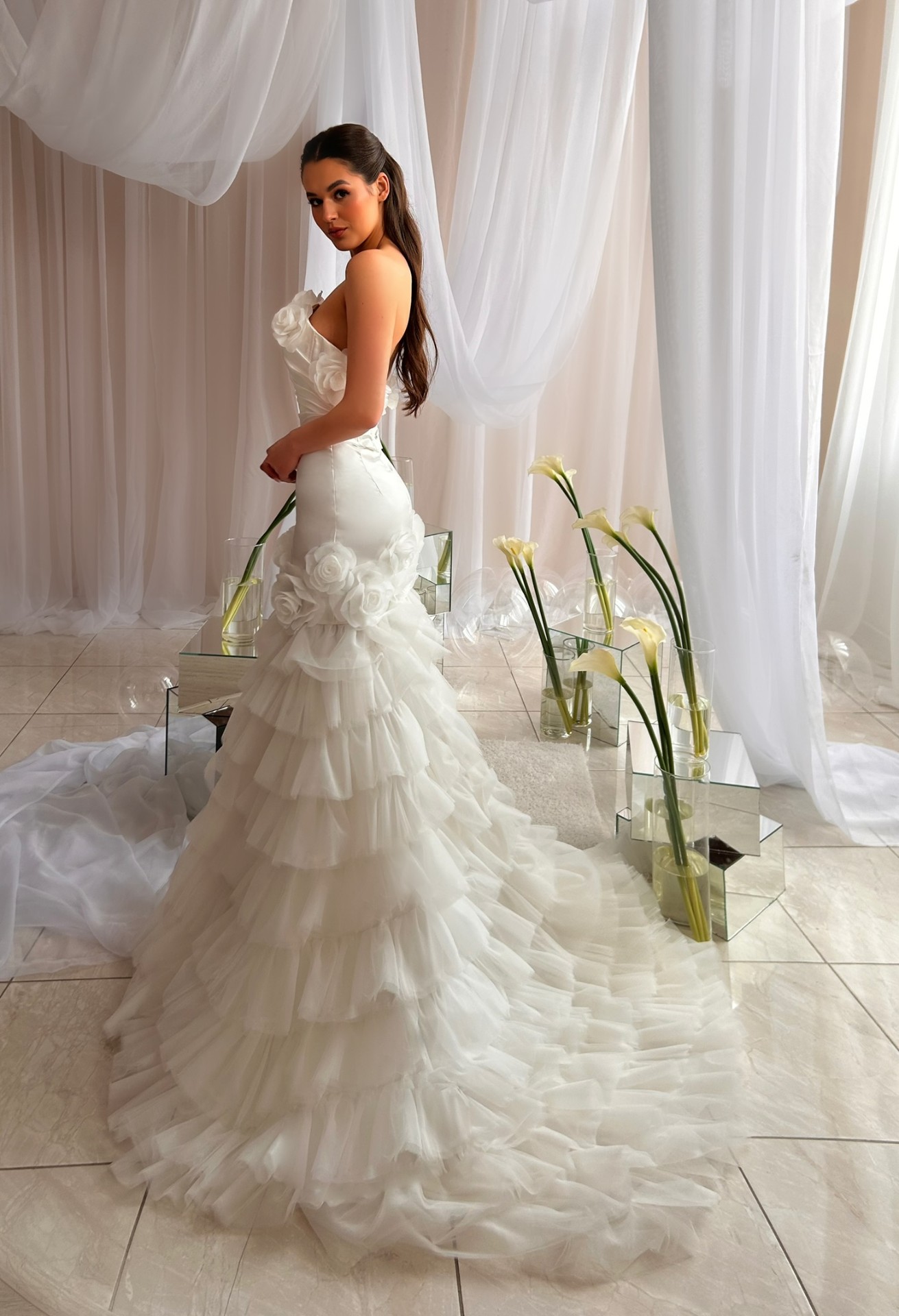 Alice — back view of voluminous tiered ruffle train
