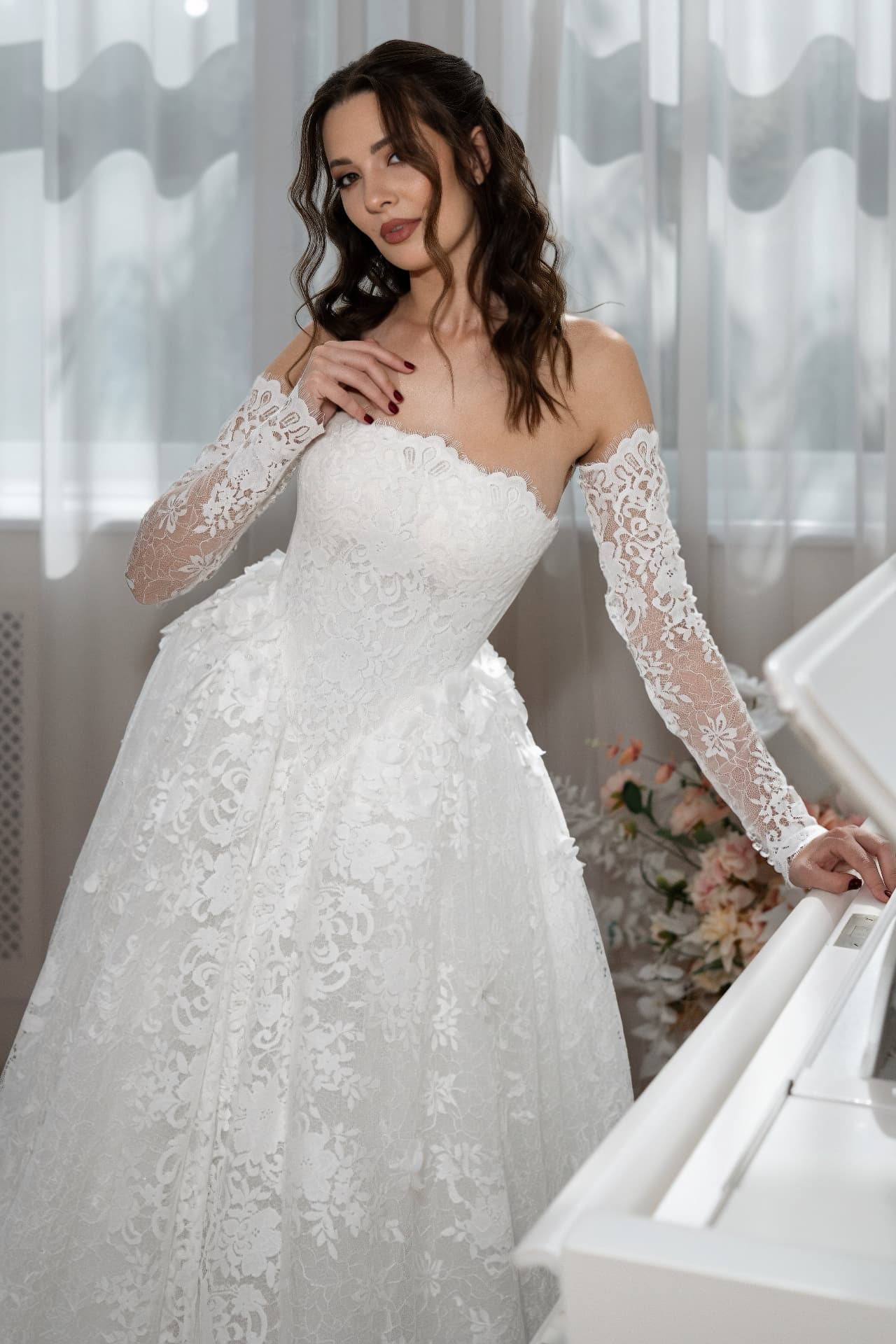 Andromeda — off-the-shoulder neckline and long lace sleeves detail