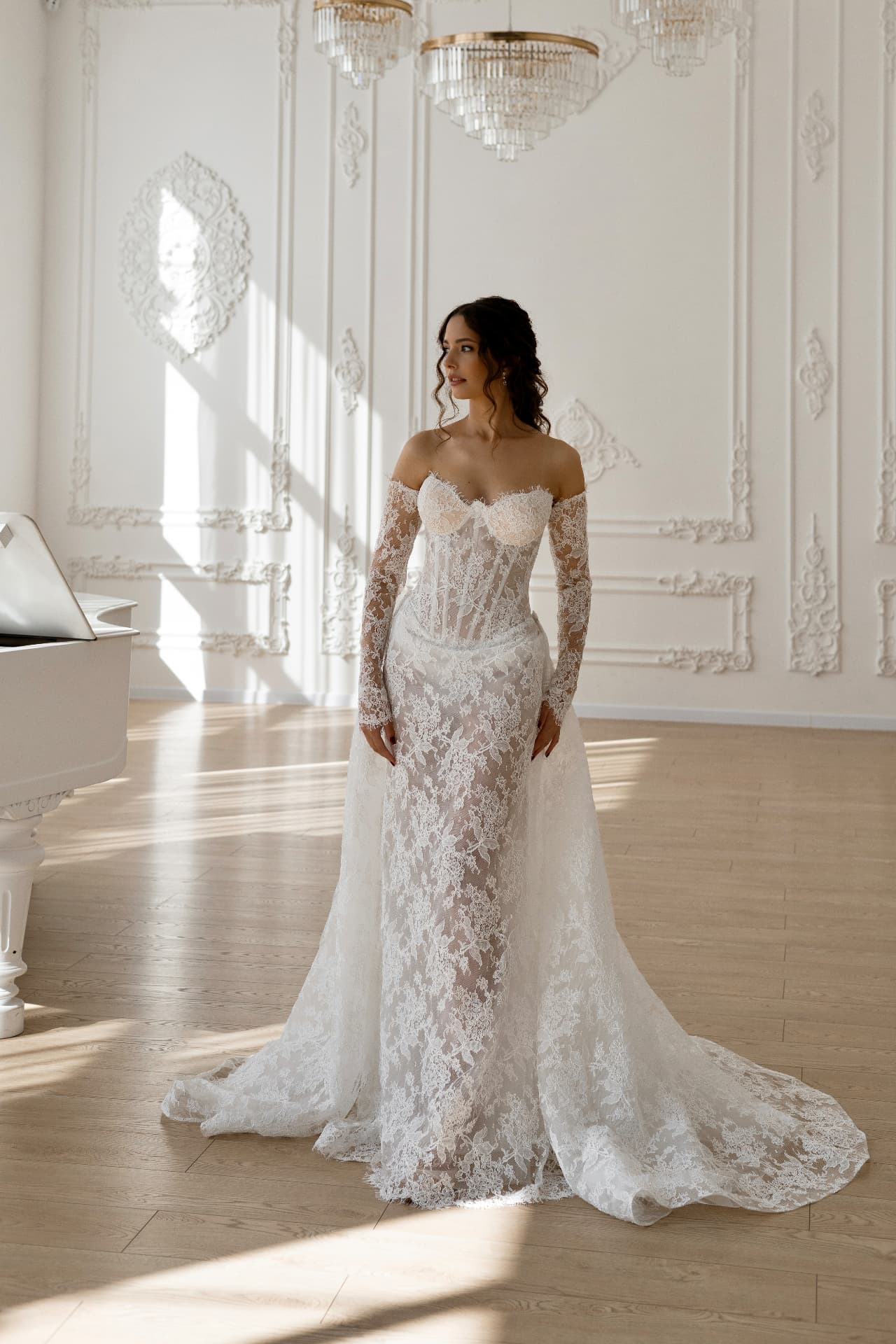 Gaia — off-the-shoulder styling with long sheer lace sleeves and lace overskirt