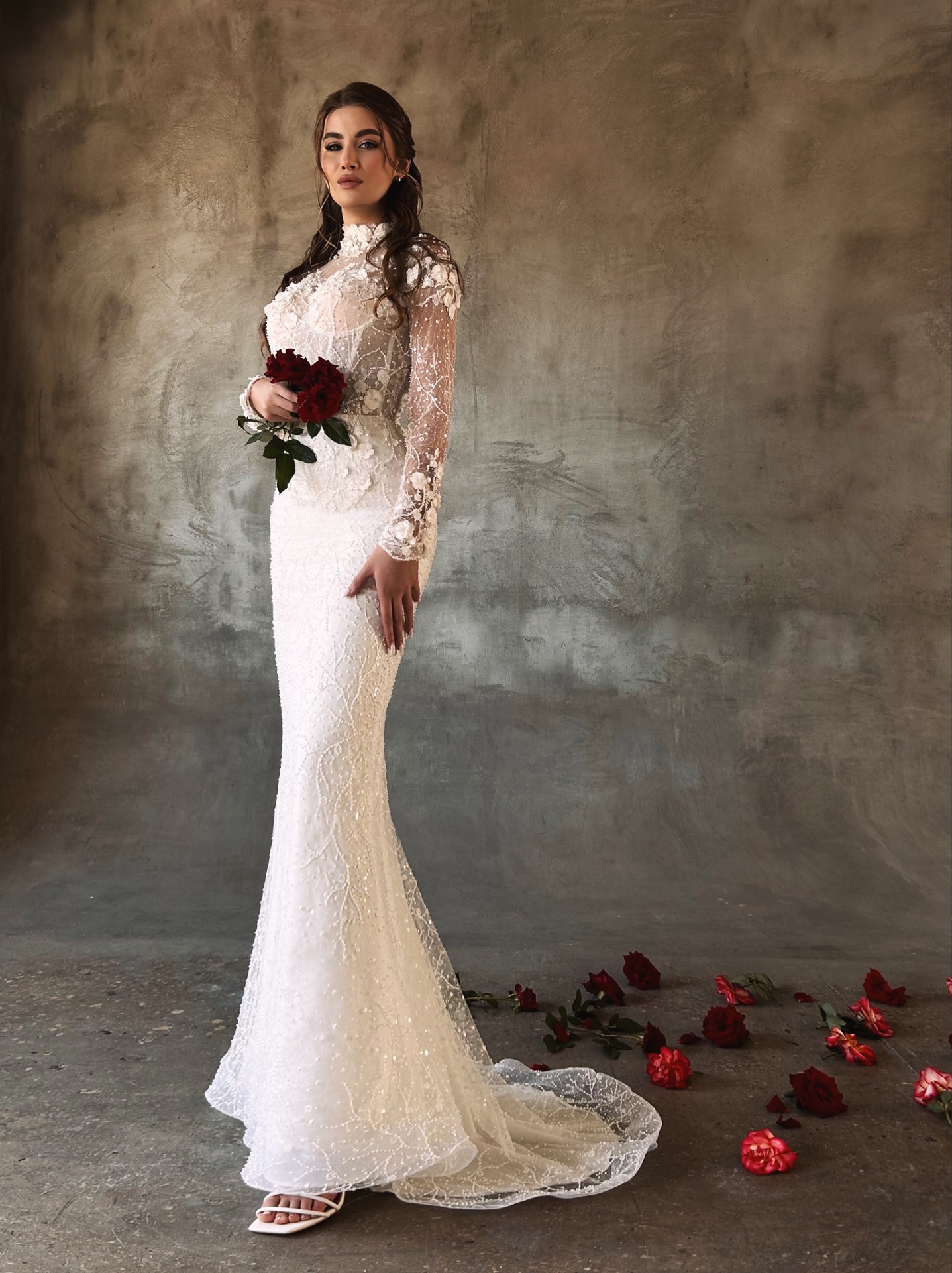 Josephine — side view of beaded mermaid skirt with lace train and red rose bouquet