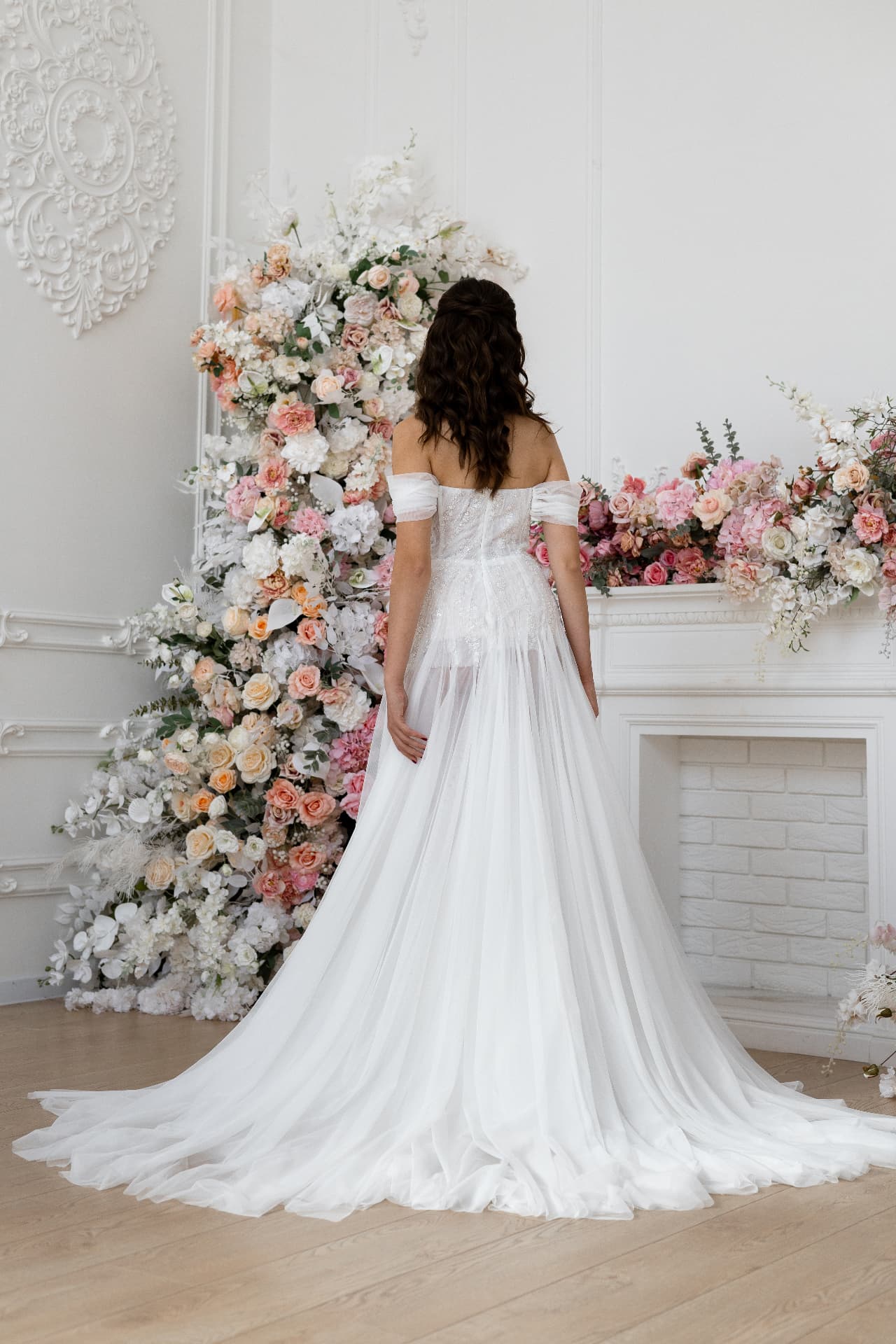 Hera — full back view showing the gown and train