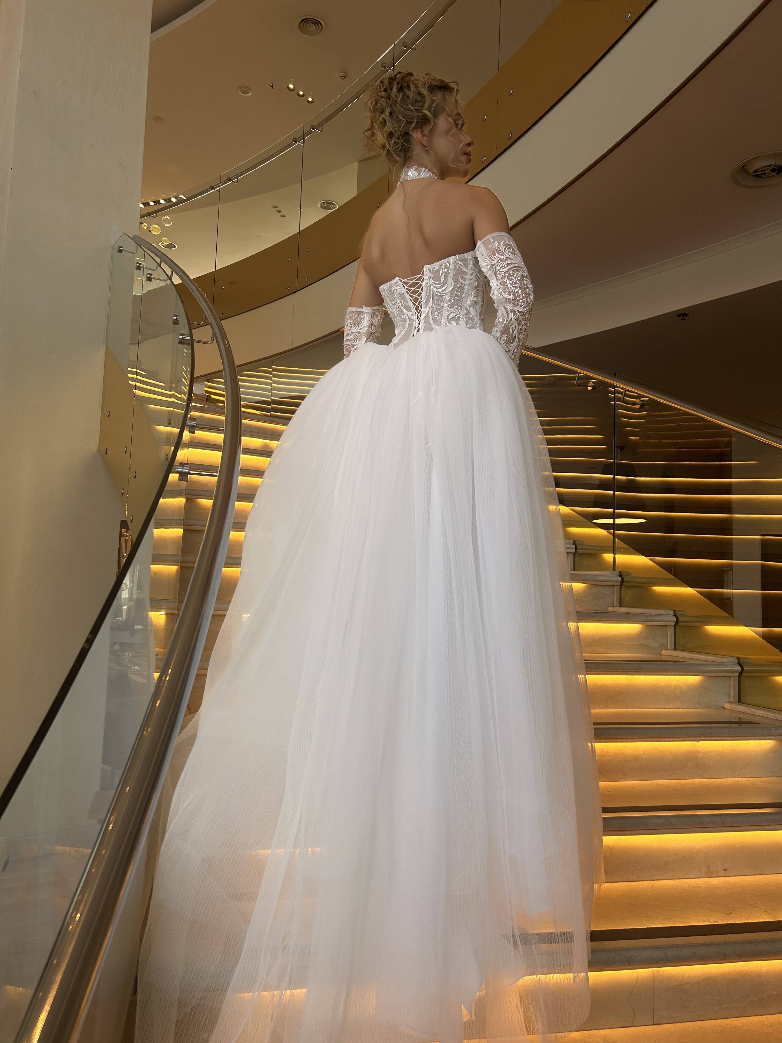 Route — voluminous multi-layered tulle skirt with lace detailing