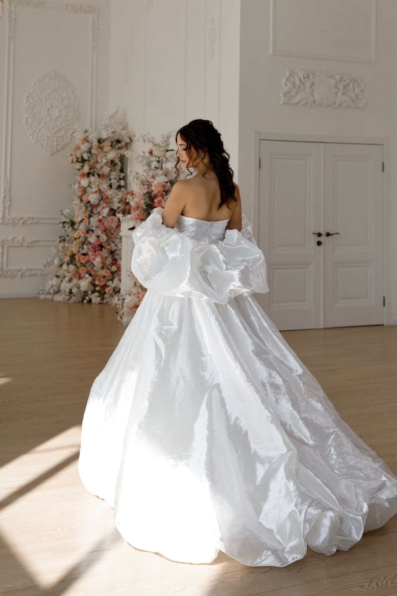 Selene — three-quarter back view with full skirt