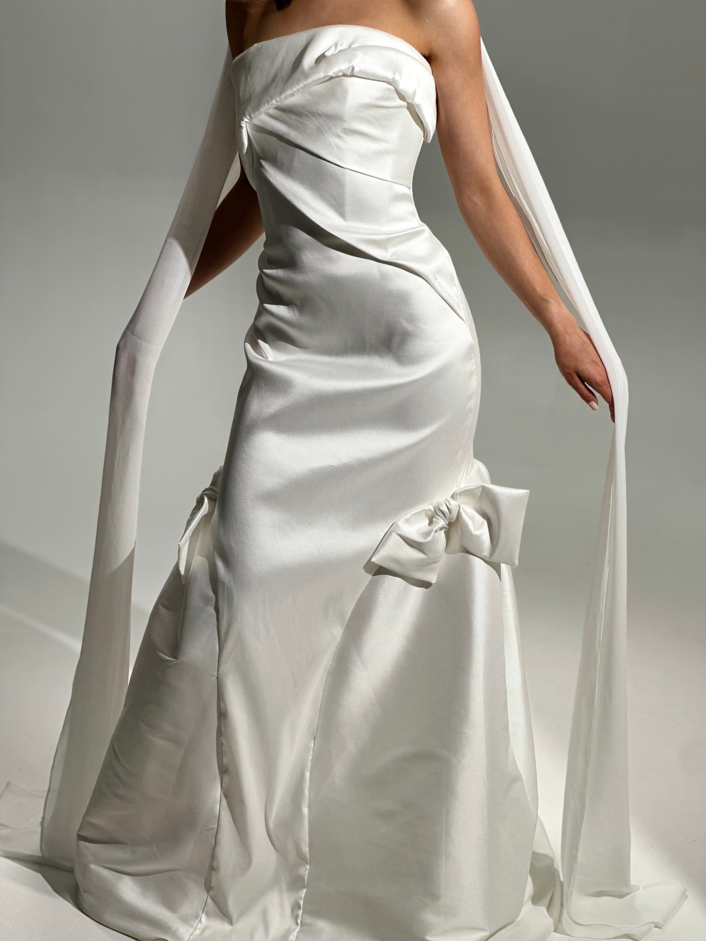 Cala — skirt bow detail