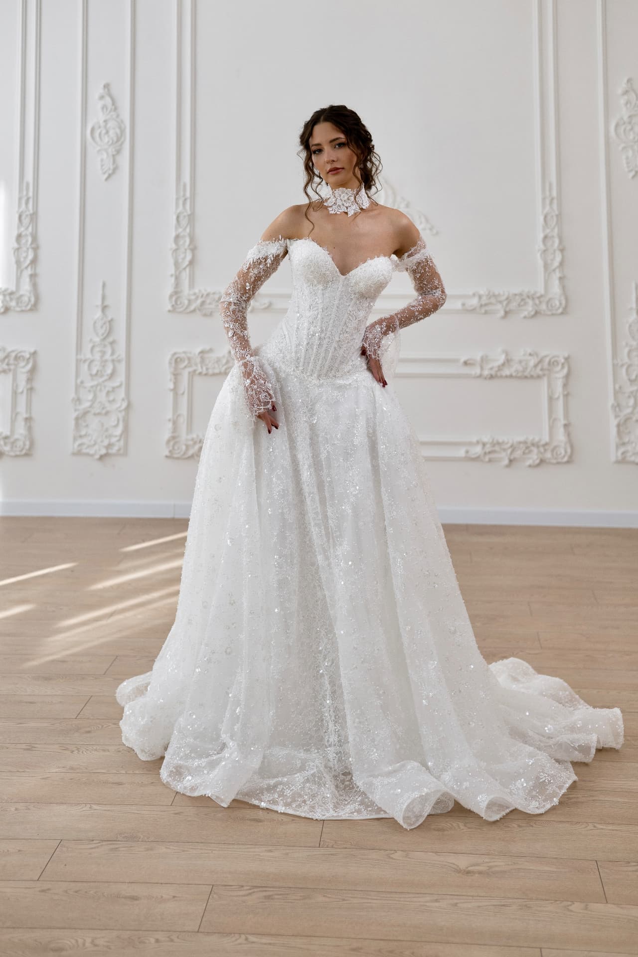 Artemis — front view with structured corset, off-the-shoulder lace sleeves and full skirt