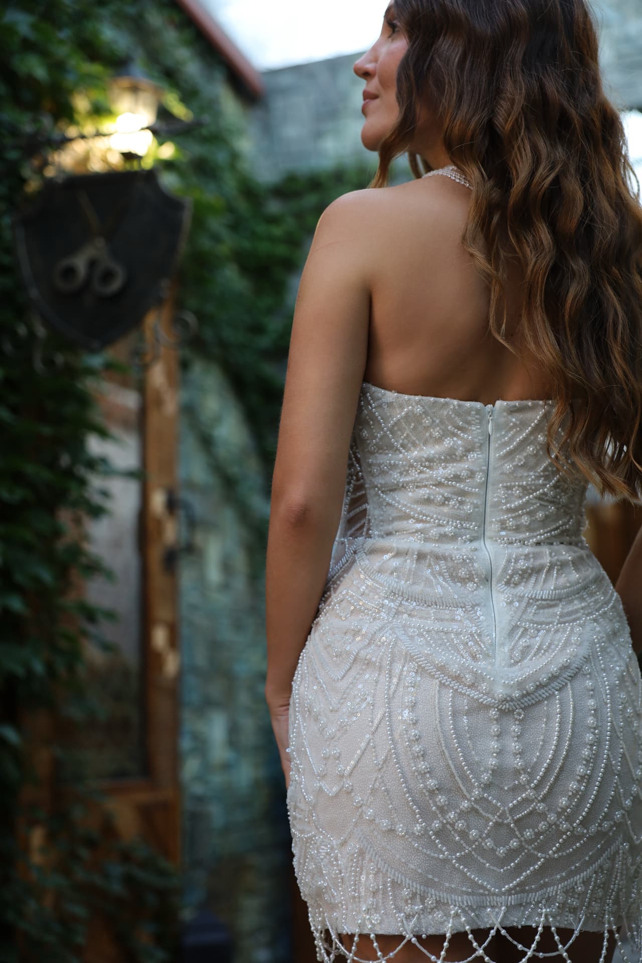 MUSE — back view, sculpted silhouette with Art Deco-inspired beadwork