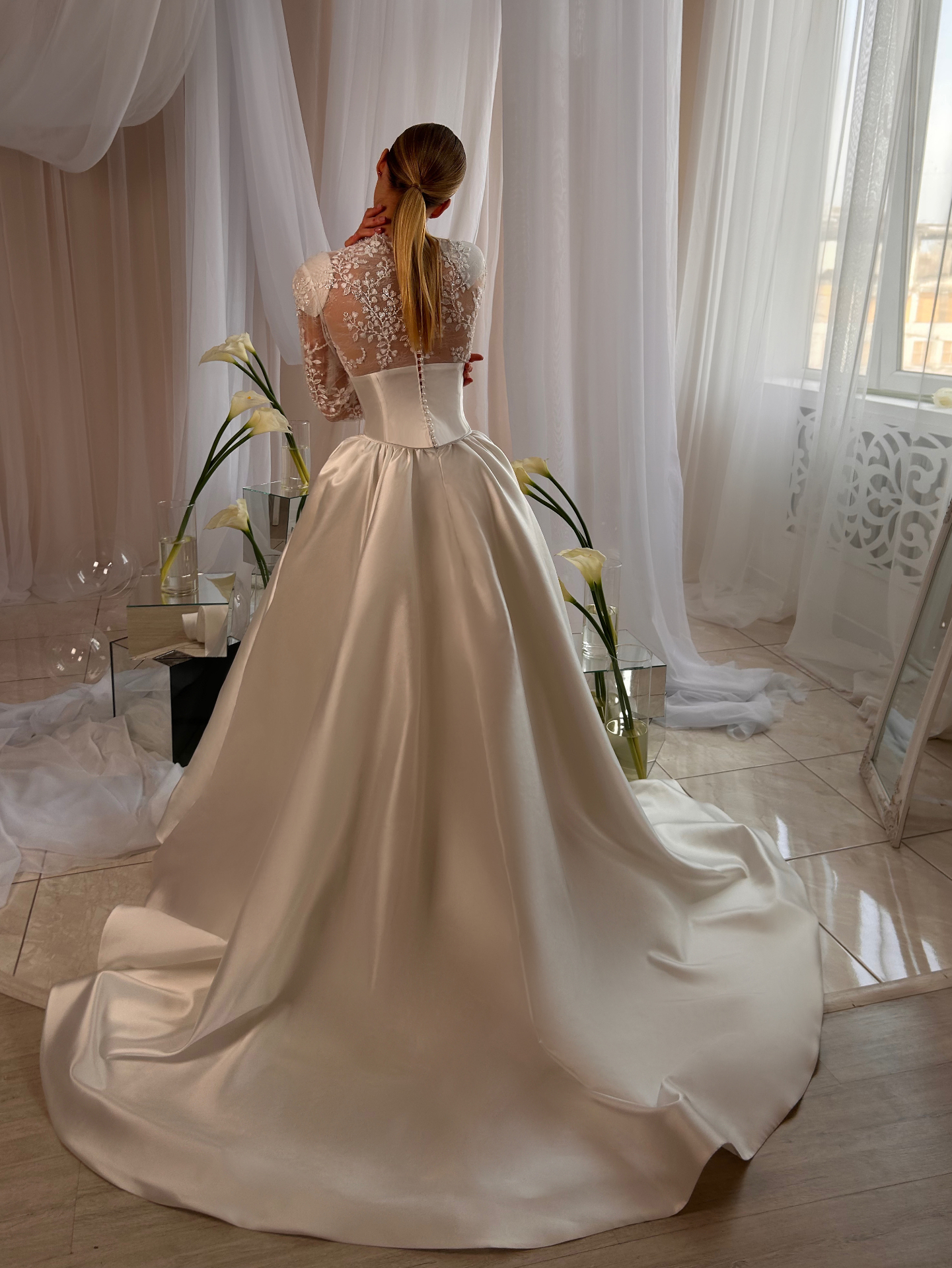 Bella — back view with sheer lace back and full satin train