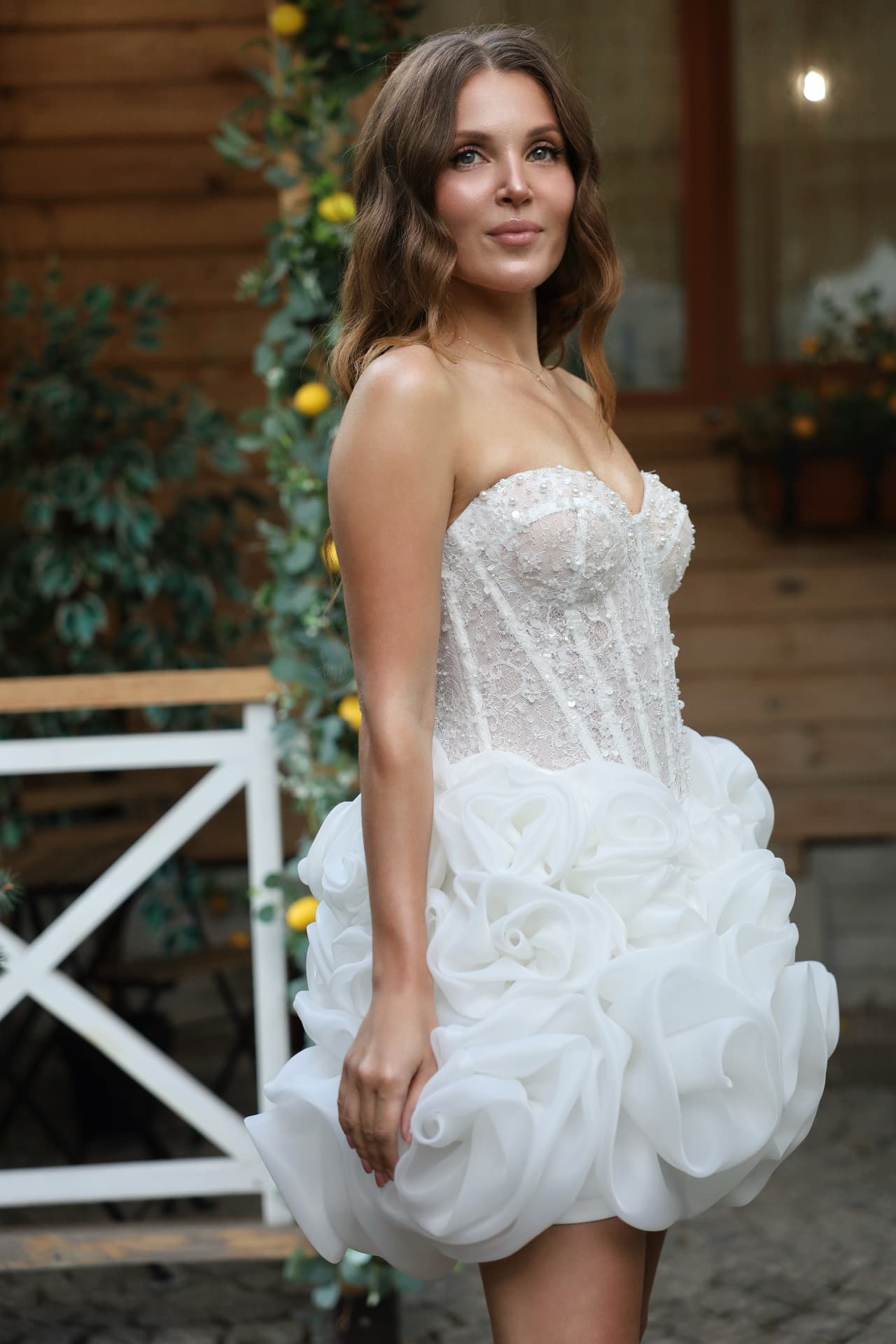 ÉCLAT — LEMAKS Afterglow strapless mini wedding dress with pearl-embellished floral lace corset bodice and sculptural petal mini skirt