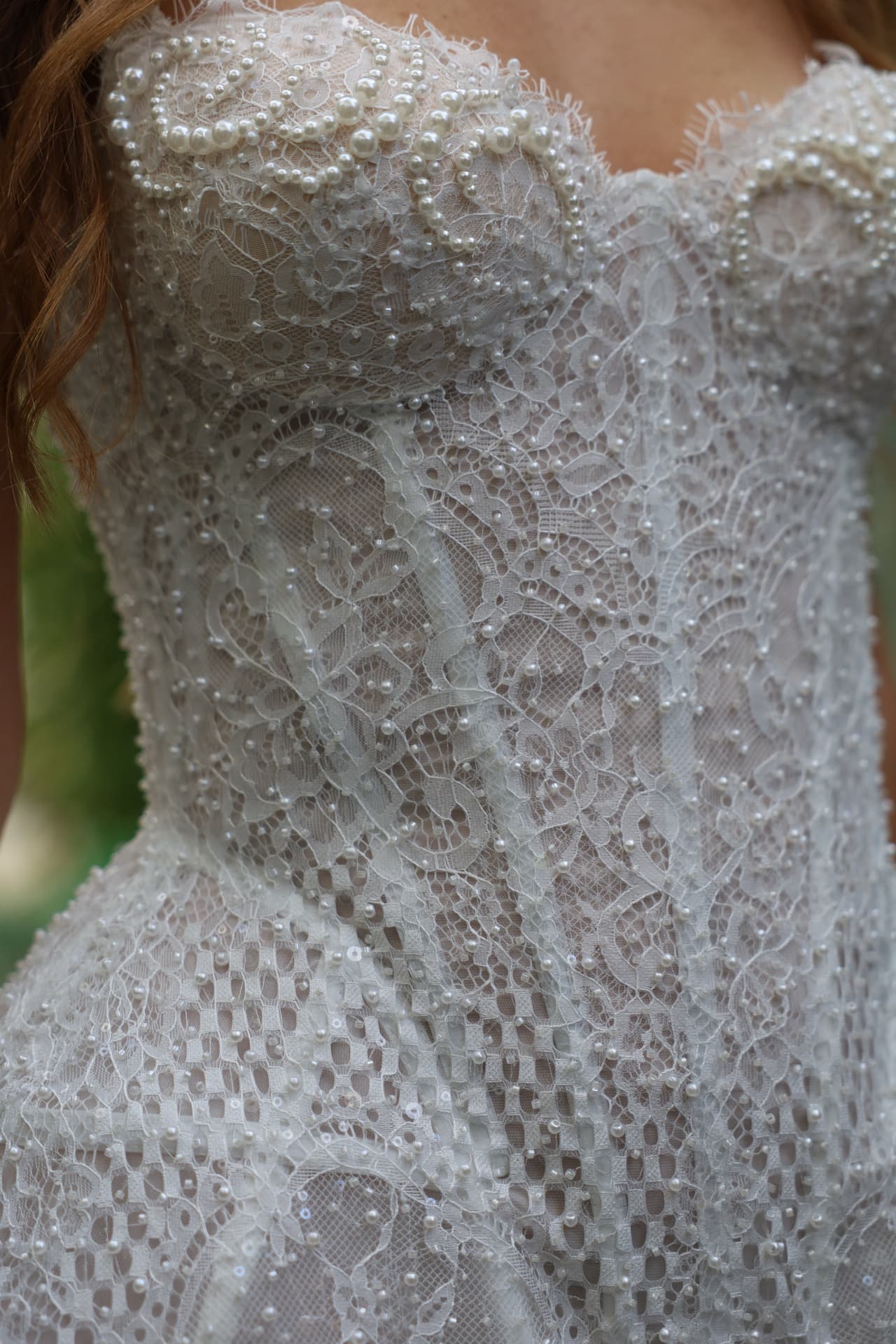 DÉSIR — detail of the scalloped lace sweetheart neckline with pearl embellishment