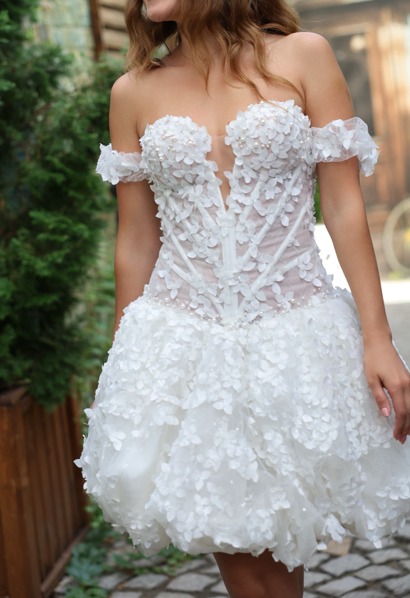 AFTER — close-up of the sculpted corset bodice with dimensional 3D flowers and pearl accents