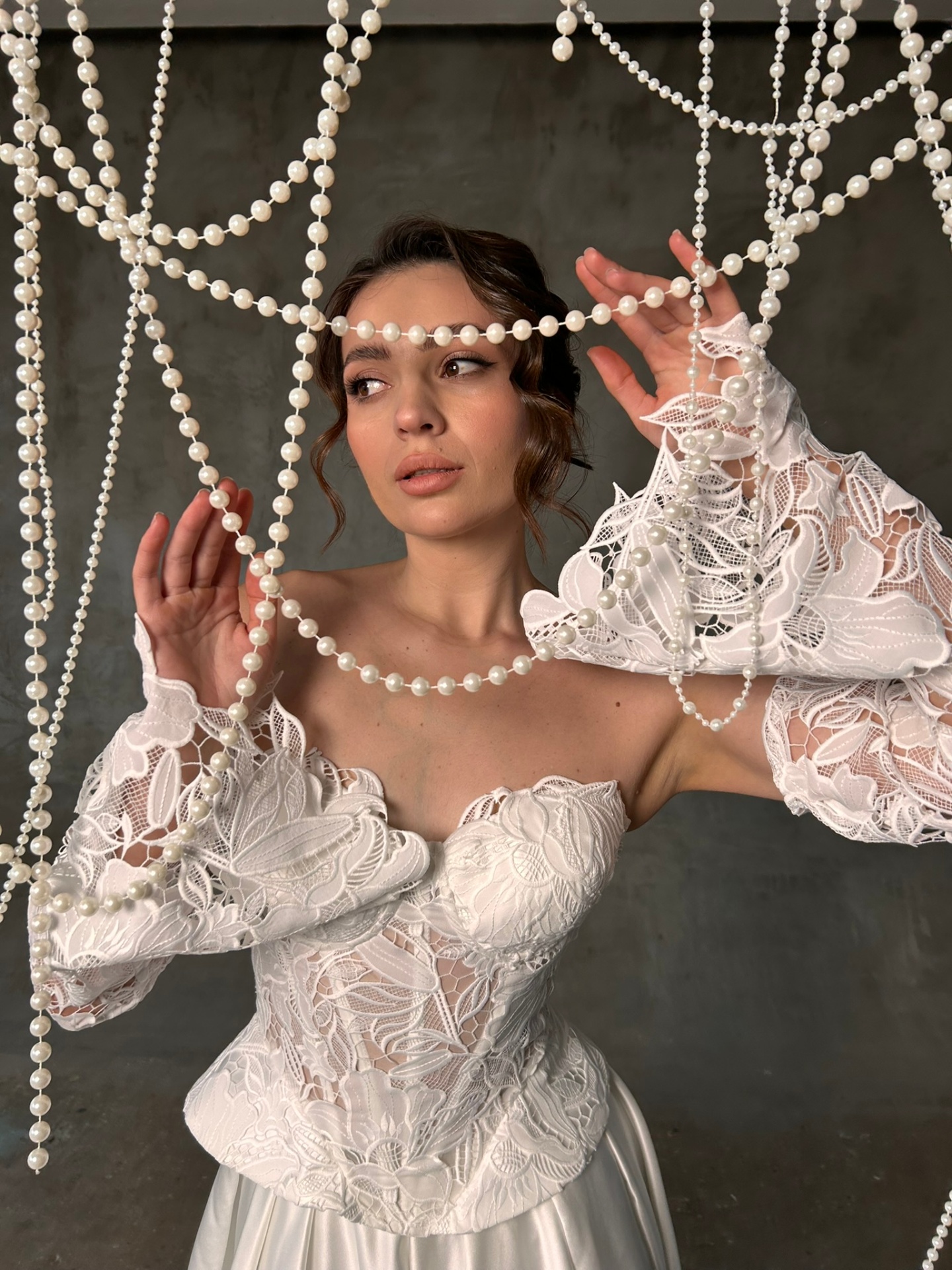 Penelope — detail of the intricate guipure lace bodice and bohemian flared sleeves