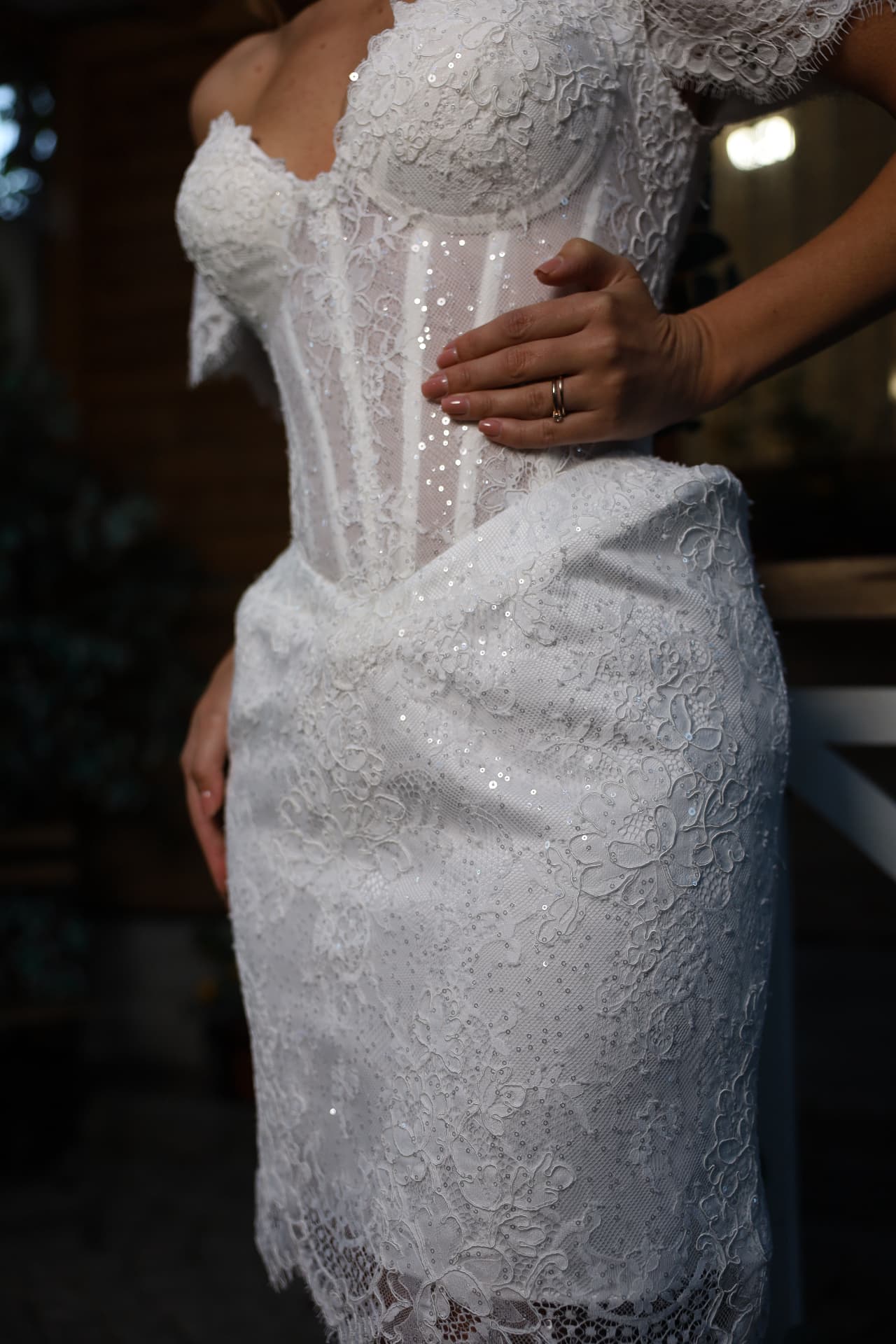 VELVET — three-quarter view showing the sculpted waist and shimmering lace details