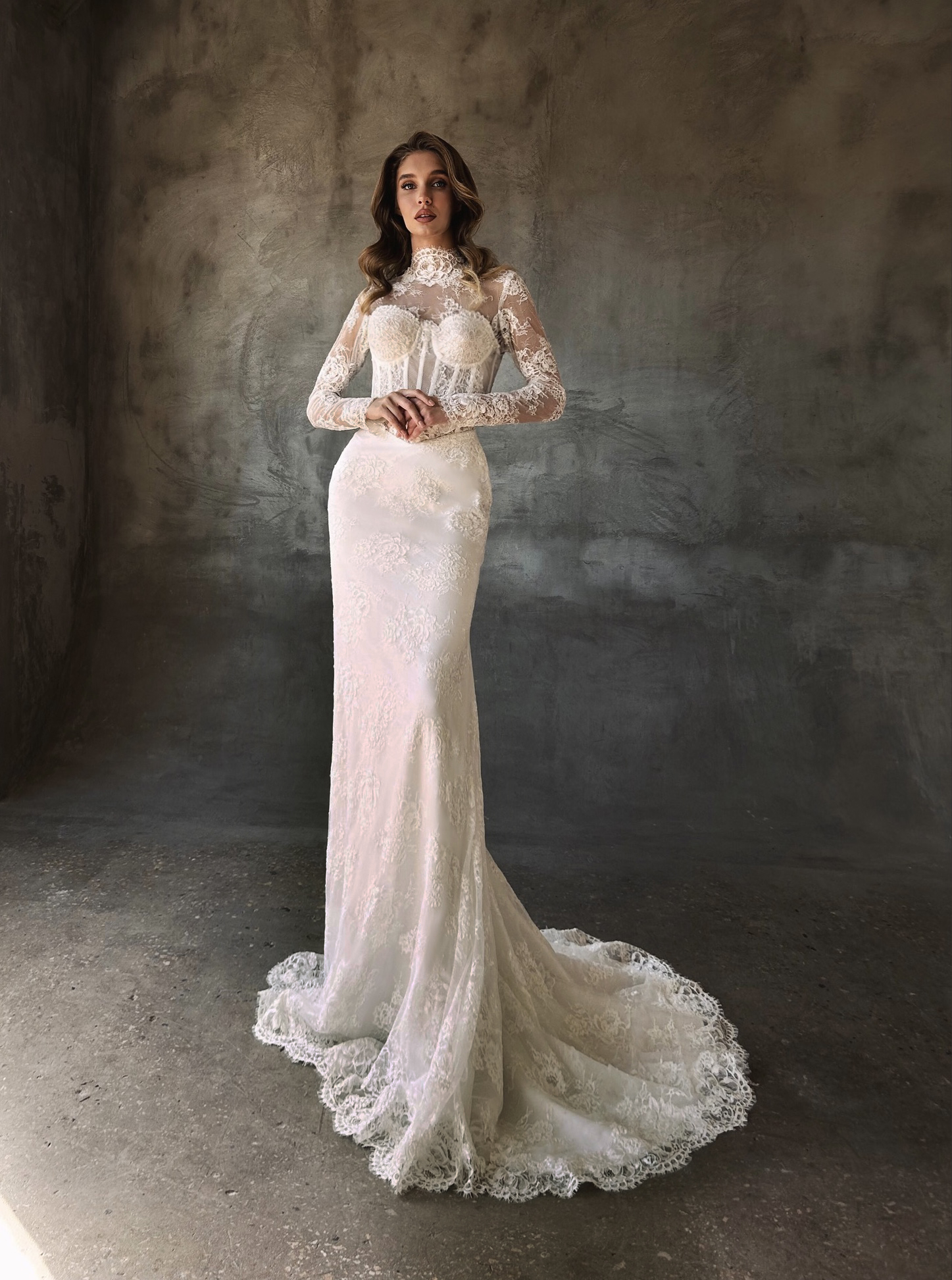 Madlen — LEMAKS Famous lace gown with sheer long-sleeved high-neck bodice and fitted silhouette