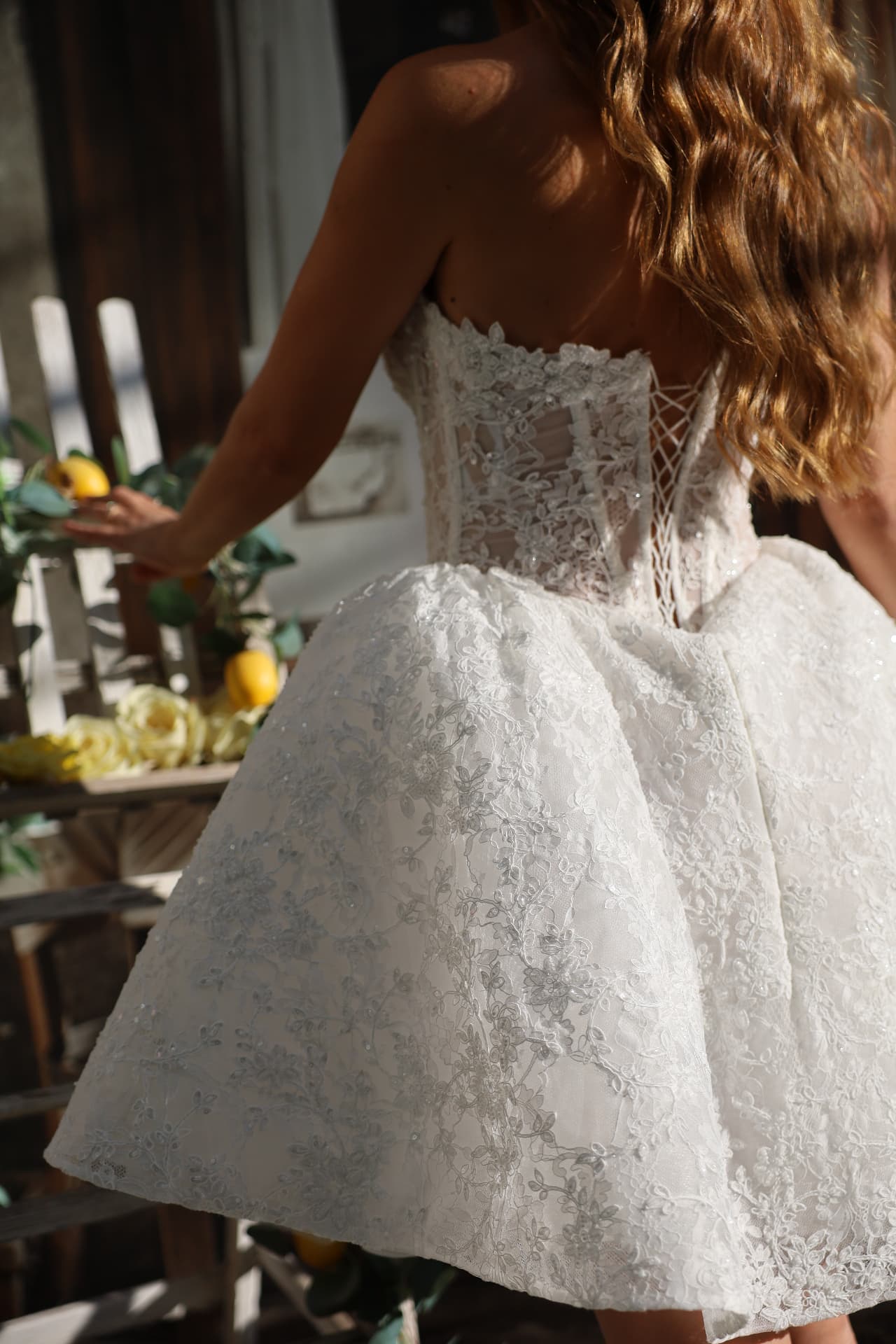 Bliss — side view, fitted silhouette accentuating the waist