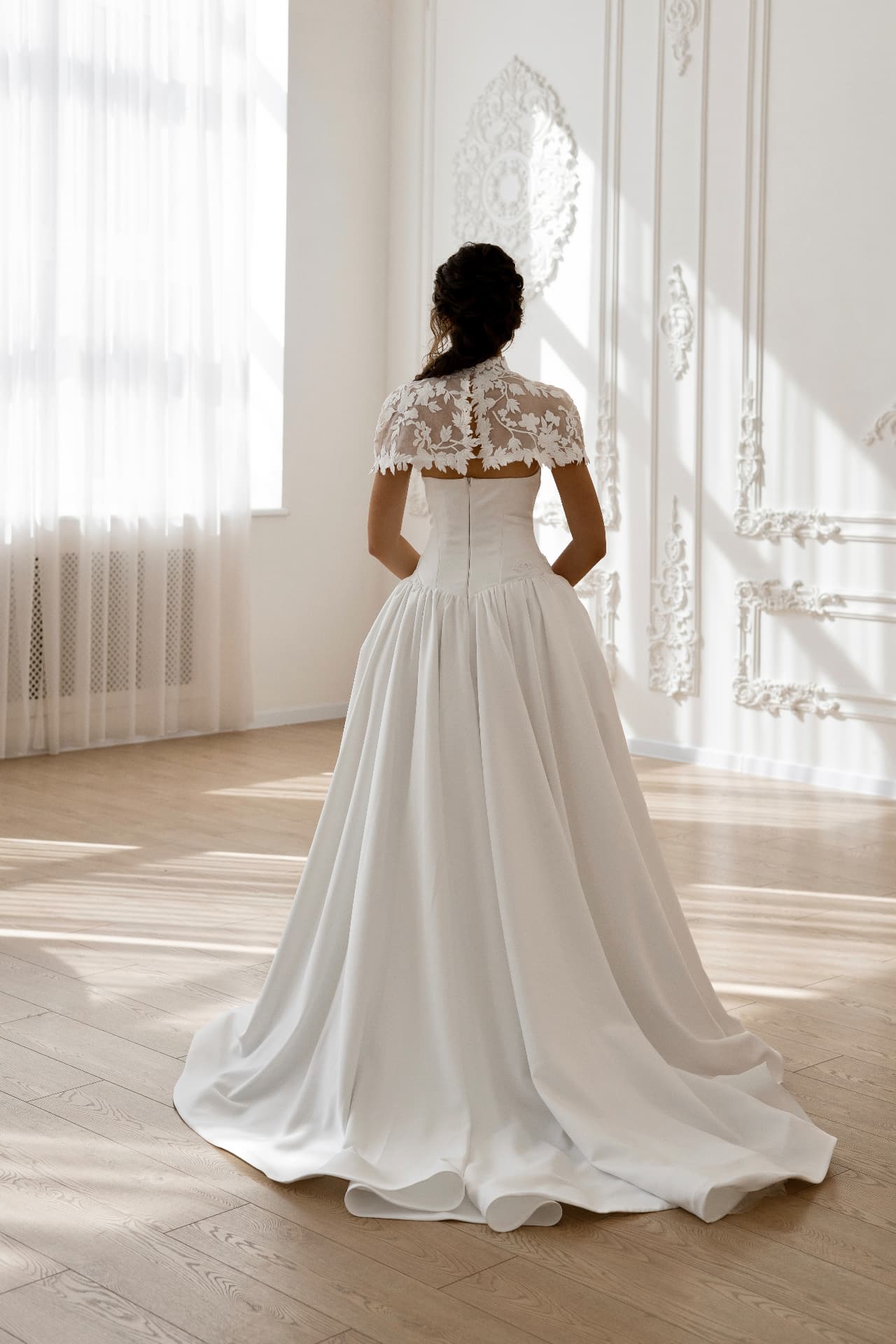 Athena — back view styled with a delicate lace capelet