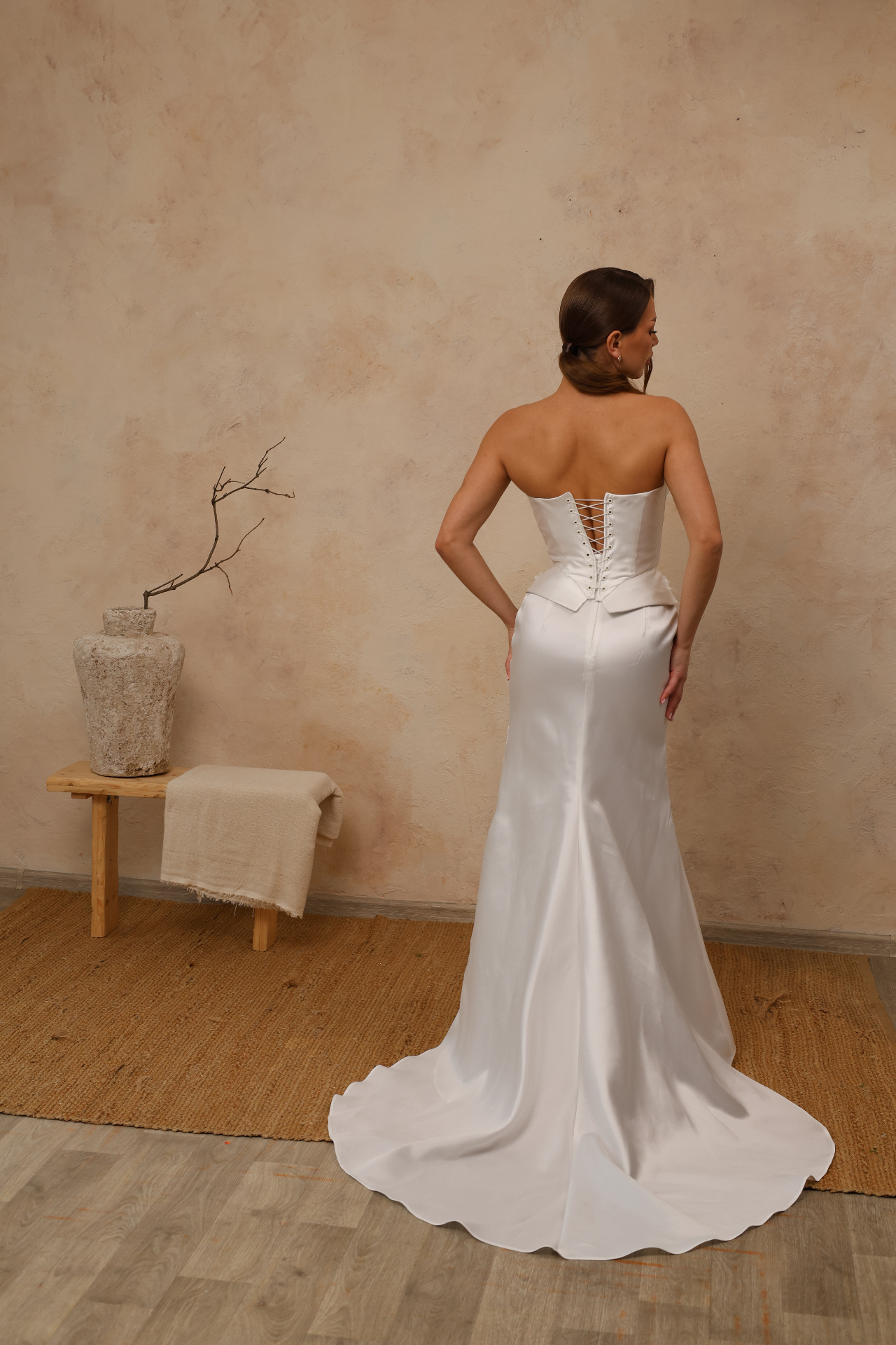 Kler — back view with corset lace-up closure and sweeping satin train