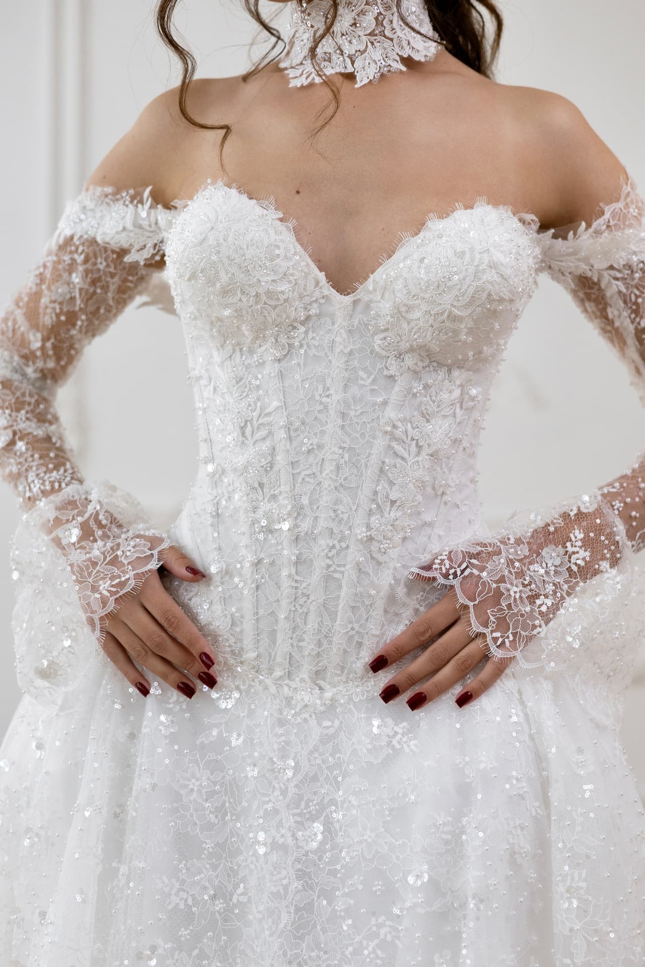Artemis — close-up of floral lace and shimmering detailing on the corset bodice
