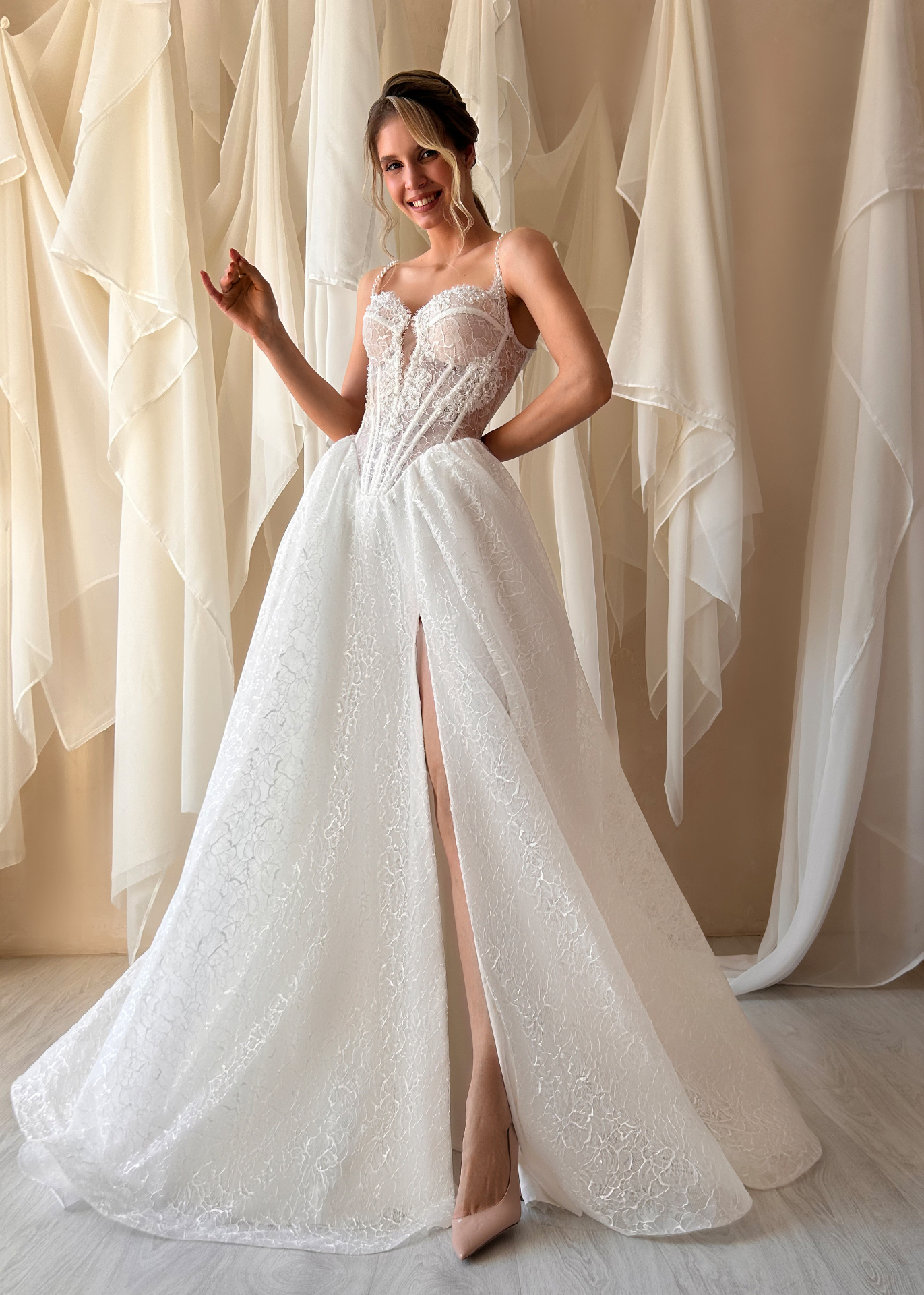 Mellissa — voluminous all-over lace skirt with dramatic leg slit and pearl spaghetti straps