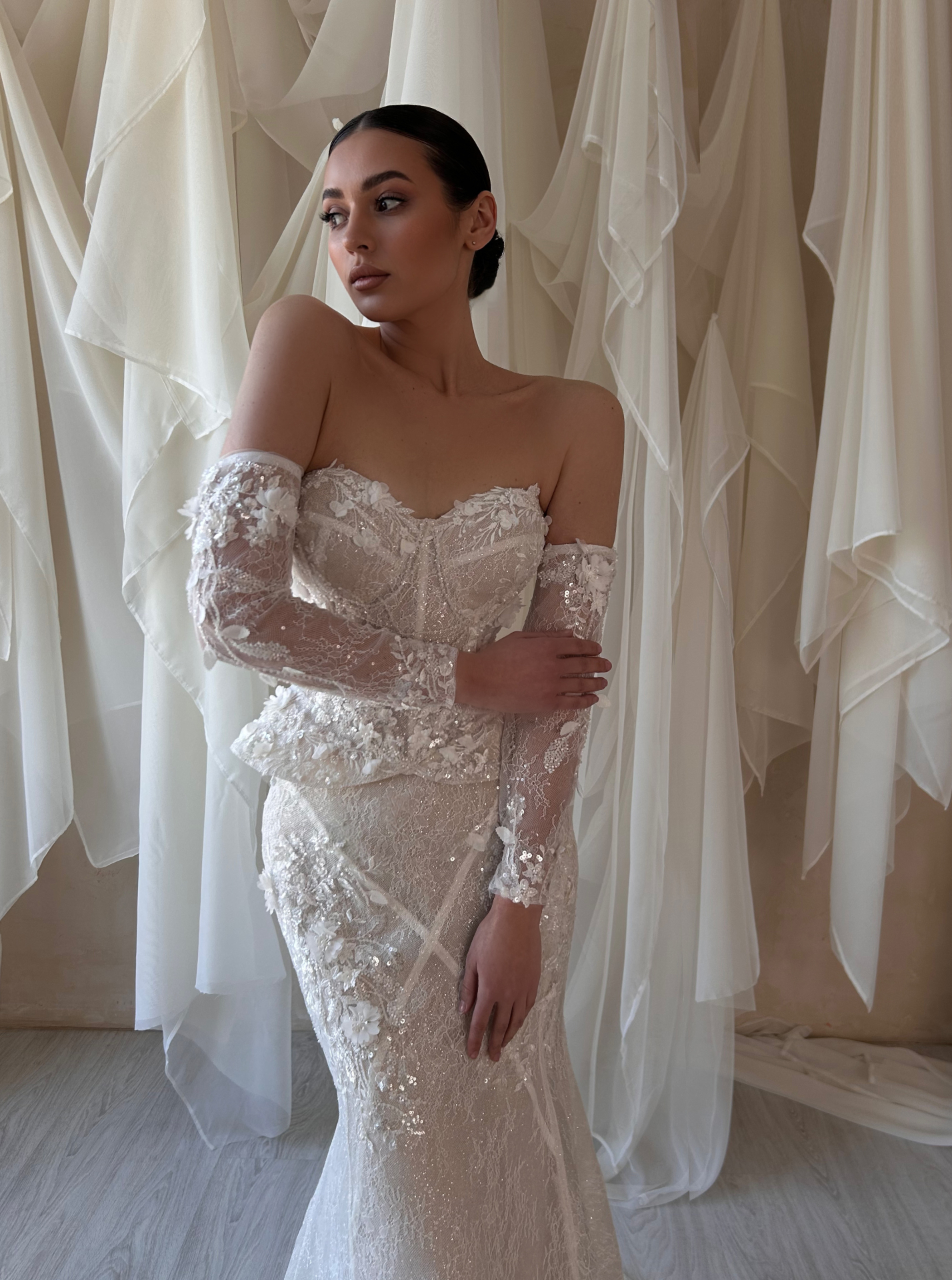 Dame — close-up of strapless corset bodice with 3D floral appliqués and sparkle detailing