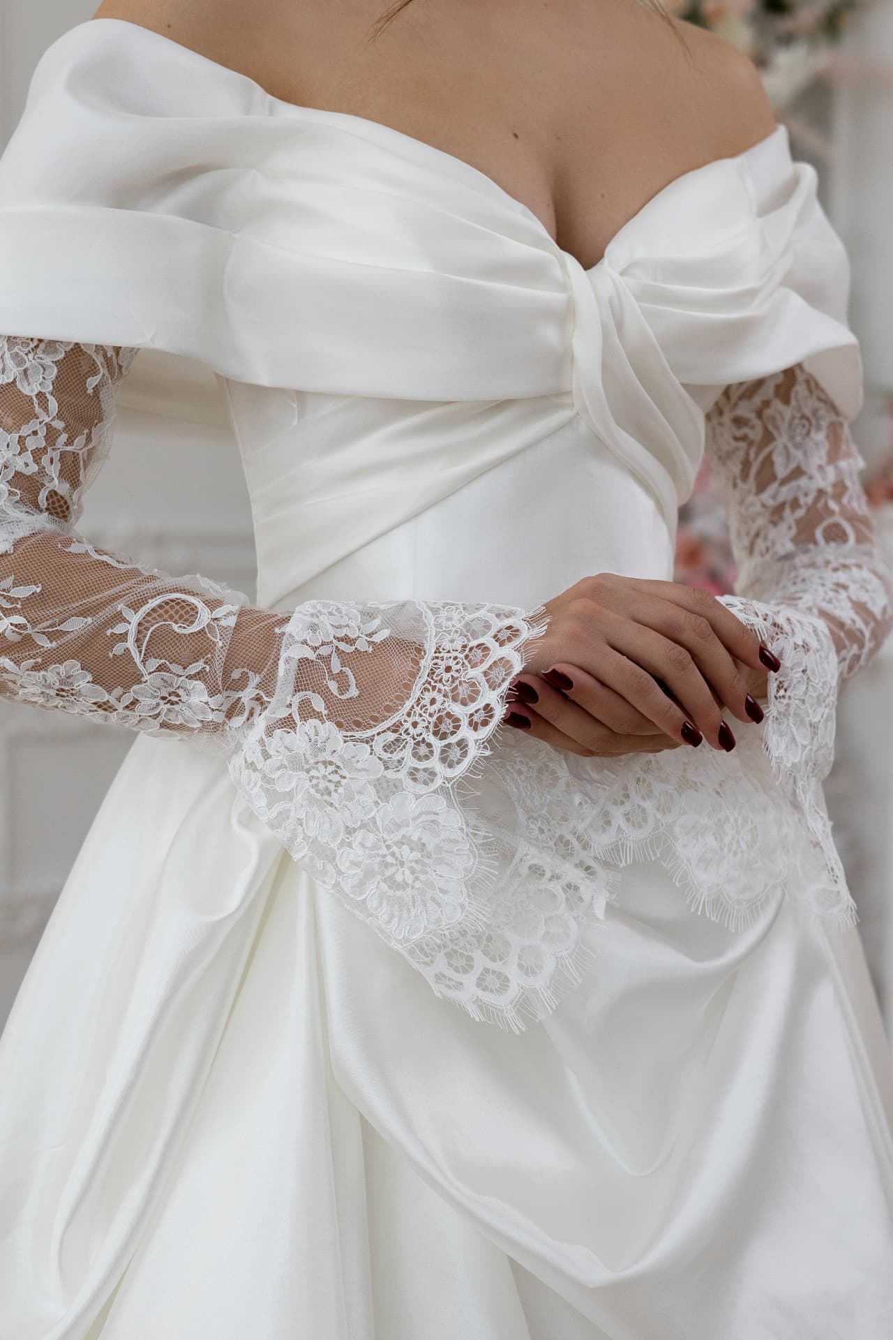 Aphrodite — sheer lace sleeves with flared cuffs and sculpted satin bodice