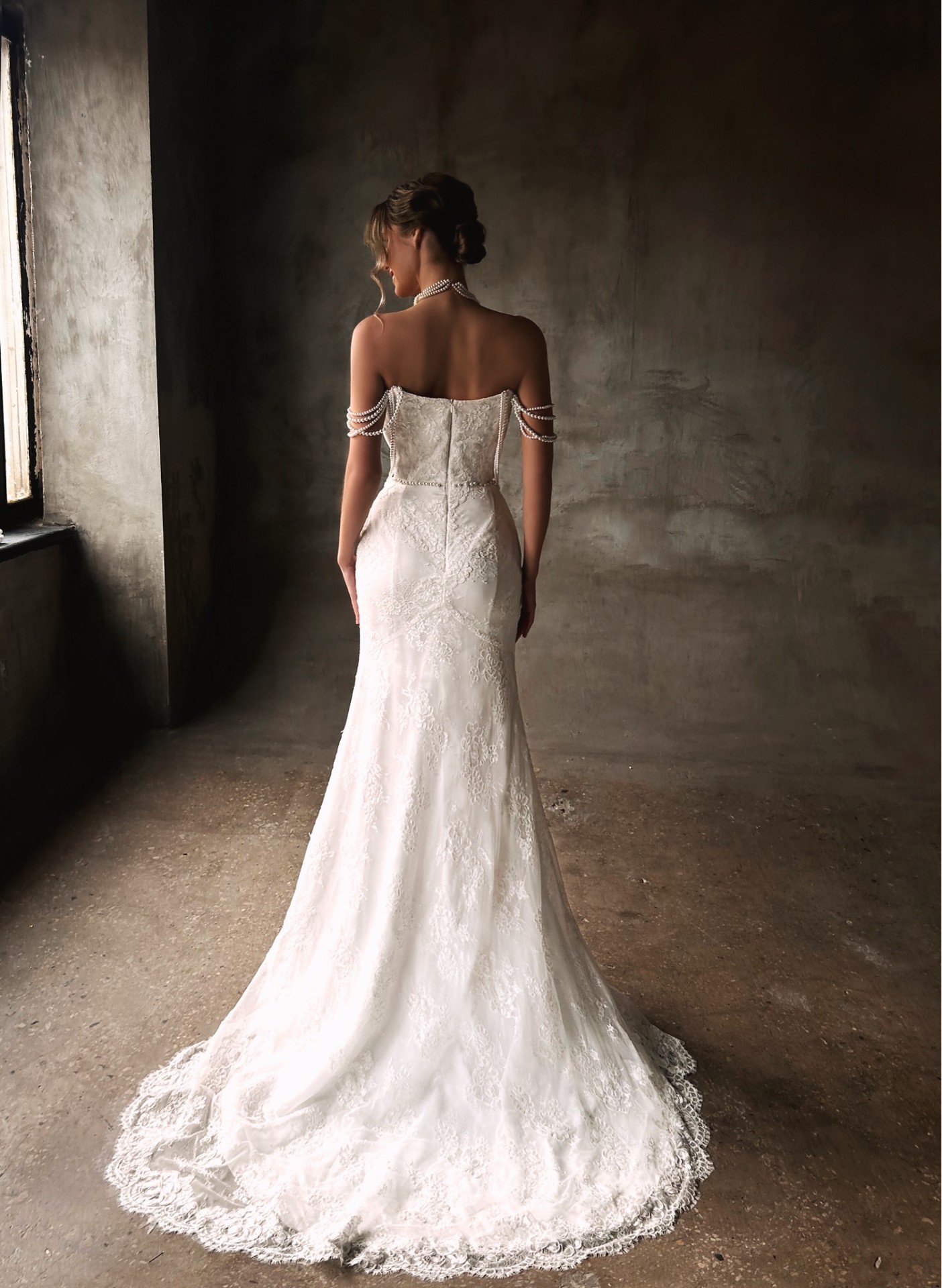 Elizabeth — back view showing pearl shoulder draping and scalloped-edge lace train