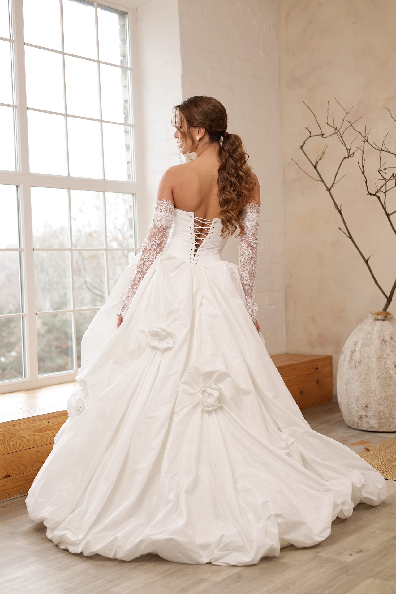 Sarah — back view with corset lacing and voluminous skirt