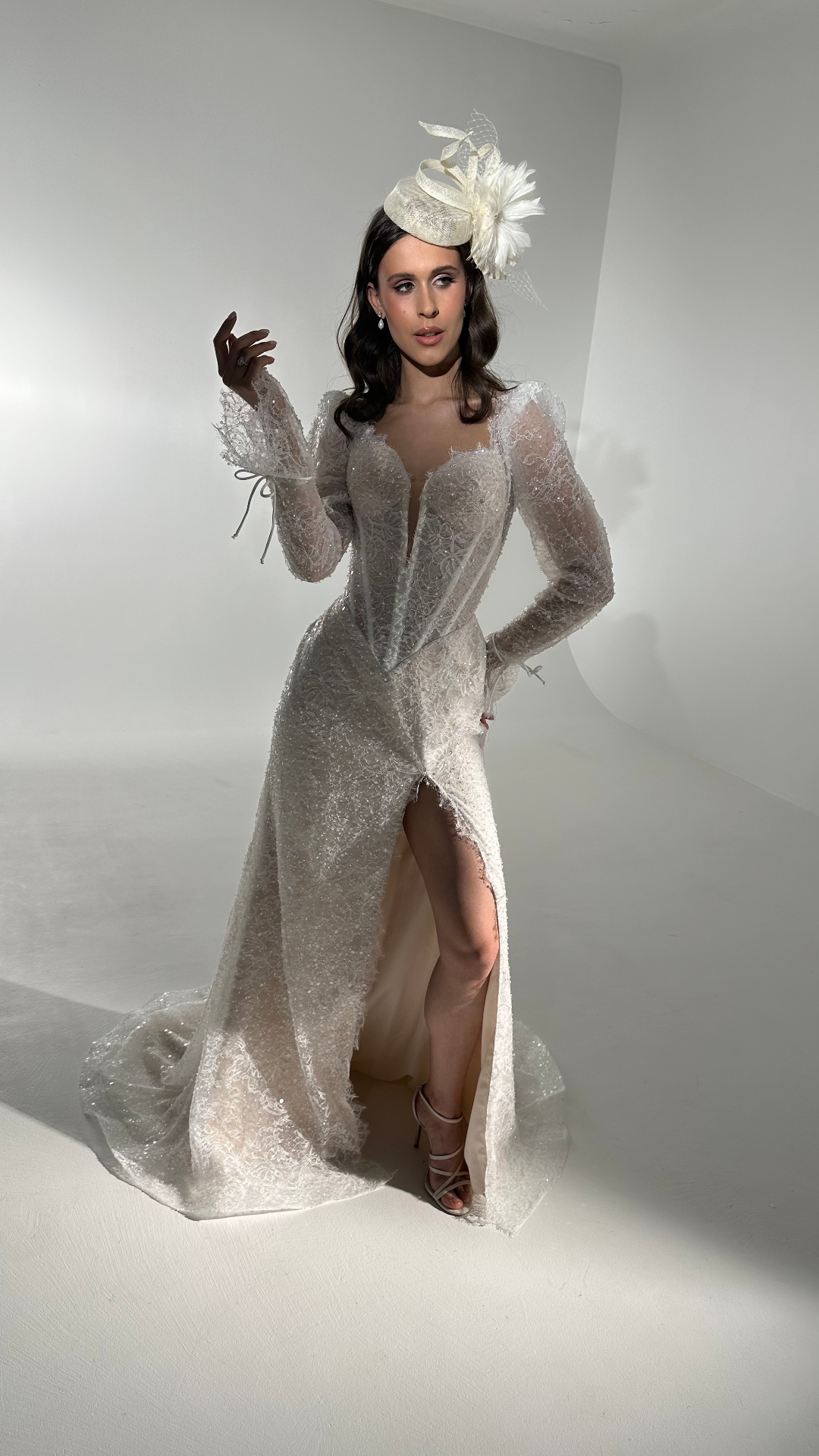 Melanie — lace gown without peplum showing thigh-high slit